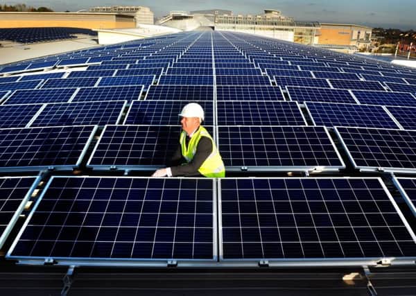 Steven Foster the General Manager of the White Rose Centre, Leeds, pictured on thr oof of the centre showing all the solar Panels.....18th October 2017 ..Picture by Simon Hulme