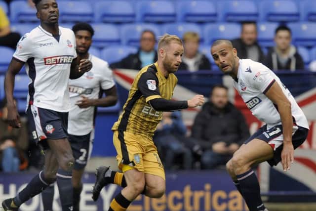 Battling for the cause: Owls' Barry Bannan.