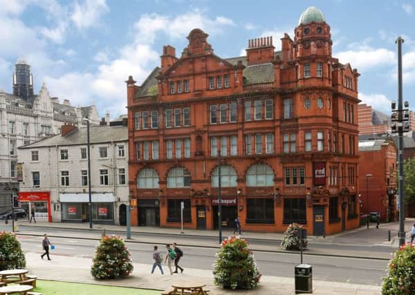 SOLD: The former Jubilee Hotel building, on The Headrow, which has sold at auction for Â£1.9m this month.