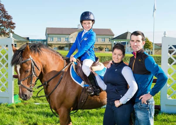 Lilly Aspell, pictured alongside her parents, Donna Aspell and Paddy Aspell, will compete in the Talented Showjumper Competition at this weekend's Yorkshire Vet at Countryside Live in Harrogate. Picture by Richard Walker.