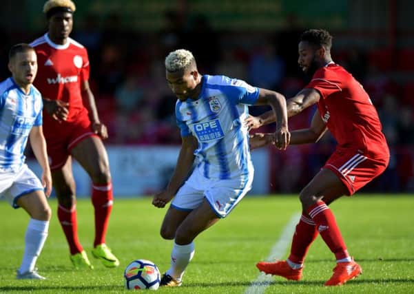 Huddersfield Town's Steve Mounie, centre. Picture: Anthony Devlin/PA