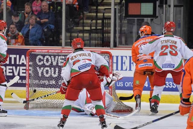 Matt Marquardt, far right, smashes the puck in from mid-air puck to make it 4-0 to the Steelers. Picture: Dean Woolley.