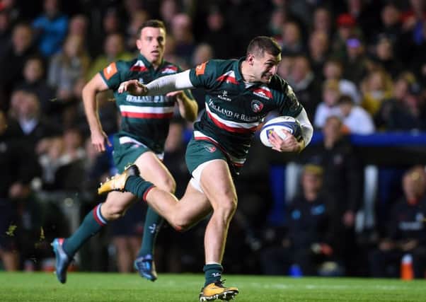 Making a mark: Leicester Tigers' Jonny May breaks away to score his second try during the Champions Cup, pool four match at Welford Road.