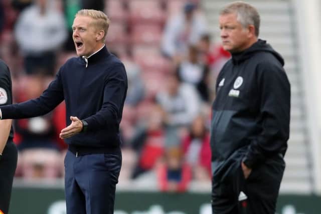 Identity crisis: For Middlesbrough manager Garry Monk, but not Blades boss Chris WIlder.