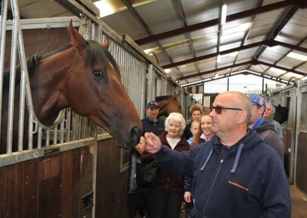 Trainer Richard Fahey with star racehorse Ribchester during an open day at the Malton Festival of Racing last month (Picture: Tony Johnson).