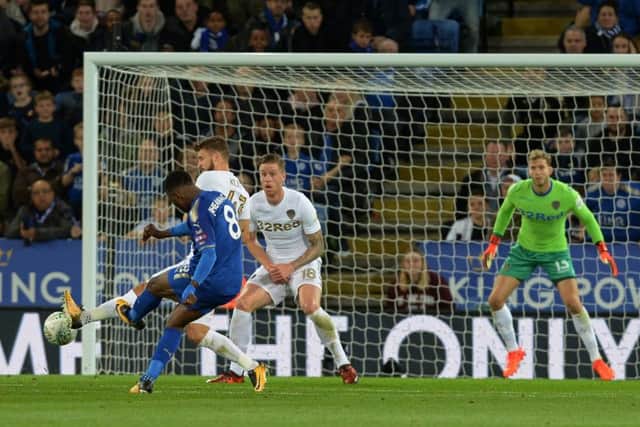 Kelechi Iheanacho strikes Leicester Citys equaliser against Leeds United to set them on their way to a 3-1 win in the League Cup last night (Picture: Bruce Rollinson).