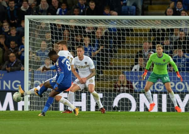 Kelechi Iheanacho strikes Leicester Citys equaliser against Leeds United to set them on their way to a 3-1 win in the League Cup last night (Picture: Bruce Rollinson).