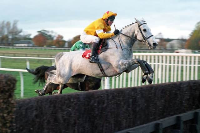 MEMORABLE TRIUMPH: One Man and Richard Dunwoody clear the last to win the 1997 Charlie Hall Chase at Wetherby.
Picture: Alan Wright/www.officialphotographersuk.com
