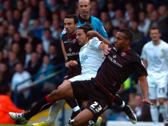 Leeds United's David Somme sandwiched between Sheffield United pair Leon Britton and Kyle Bartley