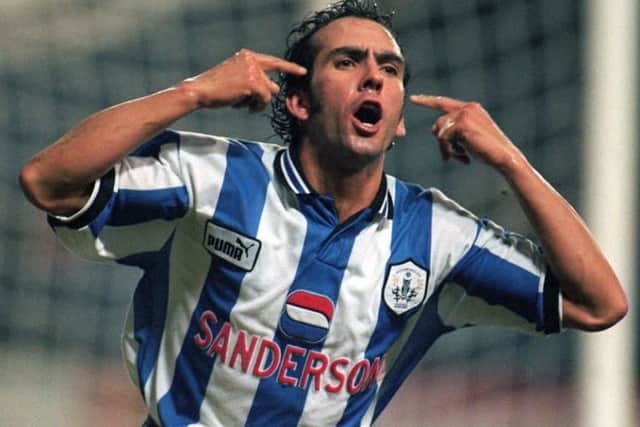 Passion: Paolo Di Canio celebrates his late winner for Sheffield Wednesday over Barnsley in the FA Carling Premiership.