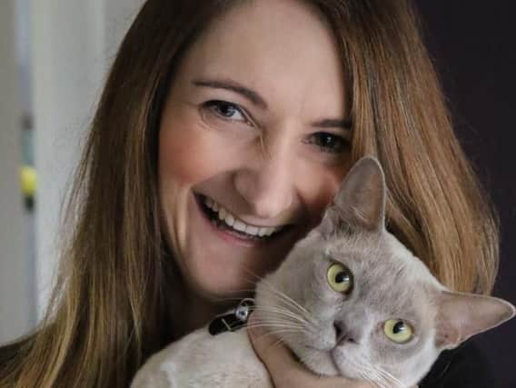 Jen with Burmese cat Jasper (photo: Mike Powell)