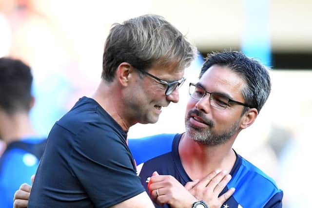 Liverpool manager Jurgen Klopp (left) and Huddersfield Town manager David Wagner greet each other before the pre-season friendly match at John Smith's Stadium, Huddersfield. (Picture: PA)