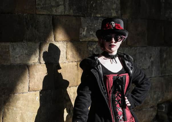 Jessica Hutson-Pope, aged 13 from Surrey visits Whitby Abbey during her first ever Whitby Goth Weekend.  Friday 27 October Picture Ceri Oakes. w174301a