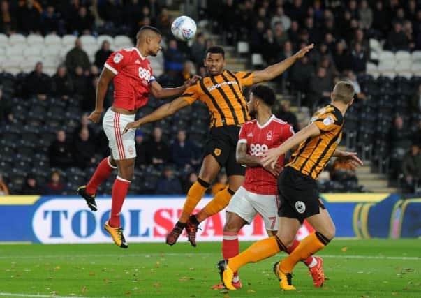 Fraizer Campbell and Michael Mancienne challenge for a corner ball, during Hull City's clash with Nottingham Forest. (Picture: Bruce Rollinson)