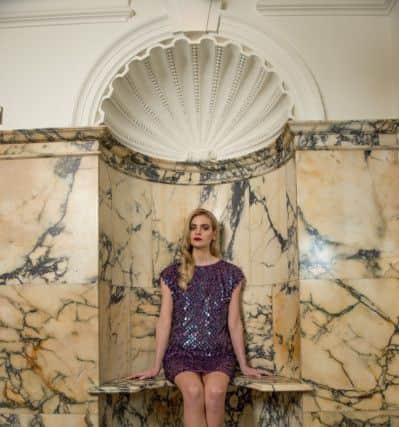 The opulent ladies' powder room at York Grand. 
Purple sequin dress, Â£169, by Damsel in a Dress; burgundy croc shoes, Â£99.95, by Moda in Pelle.

 All at Browns of York.