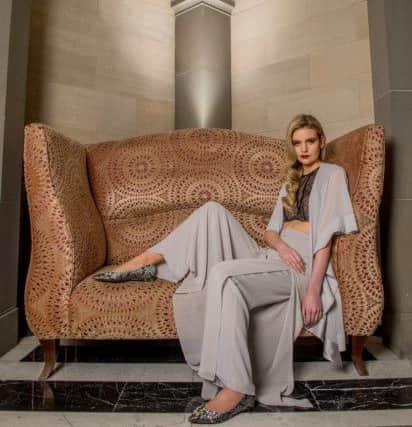 The forst floor lobby at the Grand Hotel & Spa in York. Clothes and accessories: Browns of York. 
Pale grey Jacques Vert shawl wrap top, Â£42; wide-leg layered trousers, Â£99; Be Tempted black bra top, Â£42; embellished flat shoes, Â£129.95, by Moda in Pelle.
