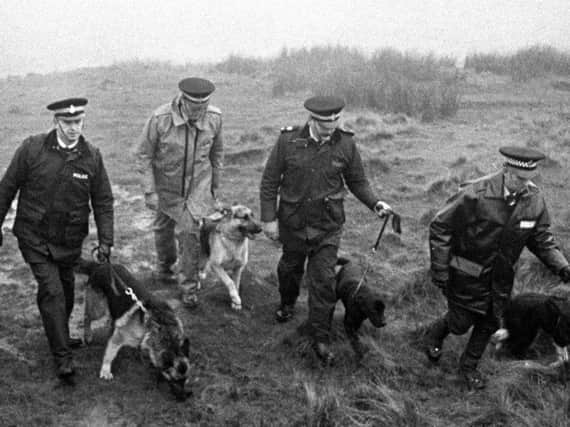 Police search the Moors for victims of Ian Brady. PA