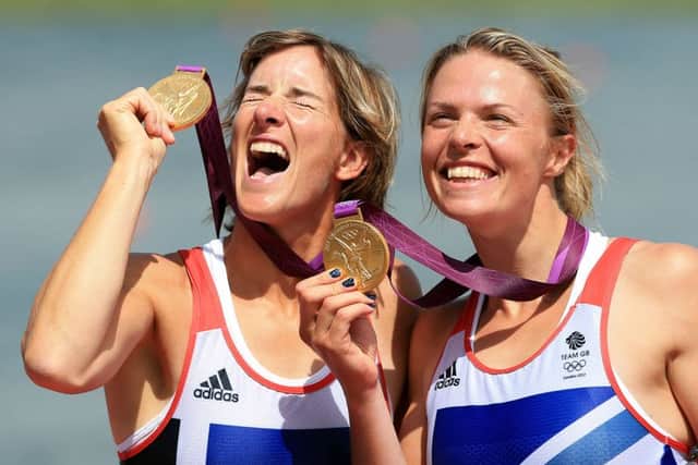 Great Britain's Katherine Grainger (left) and Anna Watkins celebrating winning gold in the women's double sculls.