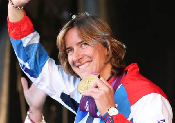 Rowing Olympian gold medallist Katherine Grainger acknowledges the crowd during the official victory parade for Scotland's Olympic and Paralympic teams in Glasgow  in 2012. (Picture: PA)