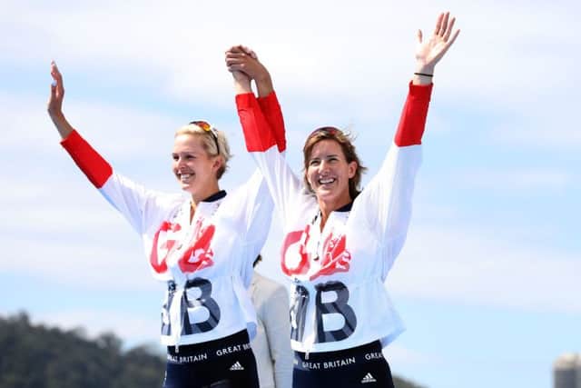 Great Britain's Katherine Grainger (right) and Victoria Thornley with their silver medals following the women's doubles sculls final A at the Lagoa Stadium on the sixth day of the Rio Olympics Games (Picture: Martin Rickett/PA Wire)