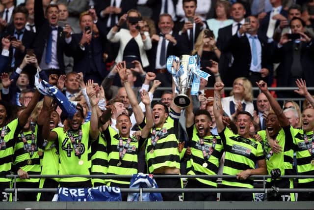 Huddersfield Town's celebrate their promotion at Wembley from last season. Picture: Nick Potts/PA.