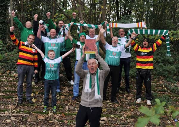 3 November 2017......   Bradford Park Avenue fans and book crowdfunders join Peter Barker, foreground on the terraces at the former ground on Caterbury Avenue in the city.
 Bradford Park Avenue fans have  crowdfunded a book on their beloved club which has made it on to the shortlist for the William Hill Sports Book of the Year.
Breaking Ground: Art, Archaeology & Mythology tells the story of how fans of the once top flight club backed an archaeological dig at the derelict Park Avenue stadium and paid for the story of what it unearthed to be told.  Picture Tony Johnson.