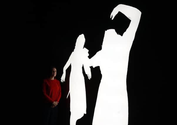 SEARING IMAGE: Alfredo Jaars Shadows, above, and, inset, the artist with his new work The Garden of Good and Evil.Pictures: Jonty Wilde and Scott Merrylees