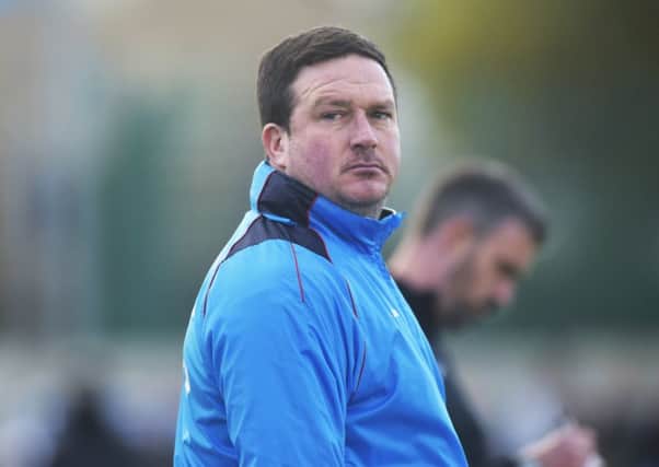 Guiseley manager Paul Cox: Eyeing a return to Mansfield Town.
Picture: Steve Riding