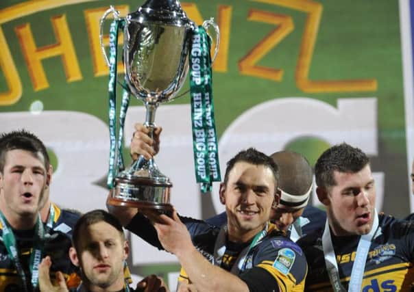 Captain Kevin Sinfield holds the World Club Challenge trophy after Leeds Rhinos victory against Manly Sea Eagles in 2012 (Picture: Steve Riding).