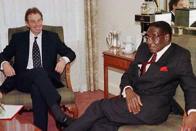 Tony Blair (left) and Robert Mugabe meet in 1997. Picture: PA Wire