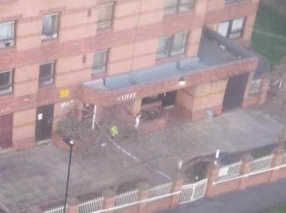 A man's body was found outside a tower block in Sheffield this morning