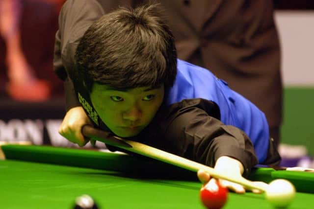 GOOD OLD DAYS: Ding Junhui, in action against England's Steve Davis during the UK Championship Final in 2005. Picture: Alistair Wilson/PA.