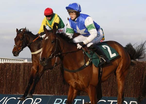 Timely win: Finians Oscar ridden by Bryan Cooper win at Cheltenham yesterday. (Picture: PA)