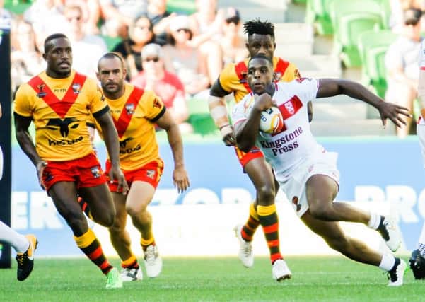 Jermaine McGillvary in action against Papua New Guinea.