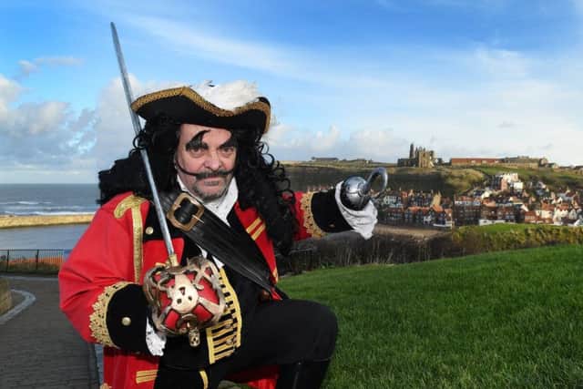 Ian Findlay dressed as Captain Hook overlooking Whitby

Pictures by Paul Atkinson