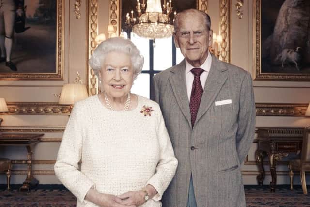 Queen Elizabeth II and the Duke of Edinburgh by British photographer Matt Holyoak, taken in the White Drawing Room at Windsor Castle in early November, in celebration of their platinum wedding anniversary on November 20. Matt Holyoak/CameraPress/PA Wire