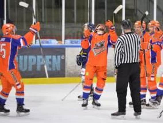 ON A ROLL: Sheffield Steelers' players celebrate their third powerplay goal against Kurbads Riga. Picture: Dean Woolley