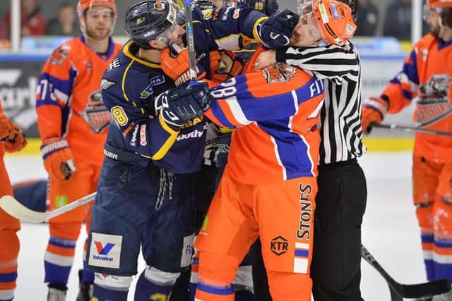 KNOCK IT OFF: Sheffield Steelers' Zack Fitzgerald gets up close and personal with Kurbads Riga's Martins Lavrovs. Picture: Dean Woolley.
