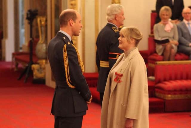 Sarah Lancashire from Twickenham is made an OBE (Officer of the Order of the British Empire) by the Duke of Cambridge at Buckingham Palace. pa