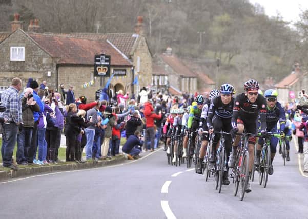 Tour de Yorkshire stage 3 Hutton le Hole . The cyclists come through .161826b