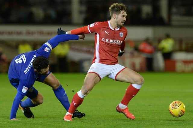 Tom Bradshaw is an injury concern ahead of Saturday's derby with Leeds United at Oakwell (Picture: Bruce Rollinson).