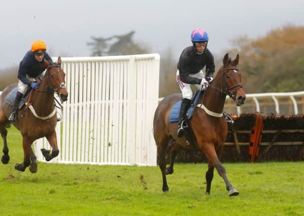Harry Cobden and Cue Card lead Tom Scudamore and Thistlecrack in a racecourse gallop during Badger Chase Day at Wincanton. Picture: Julian Herbert/PA