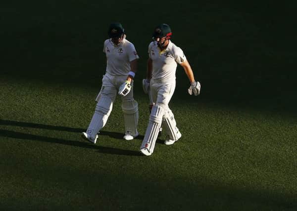 Australia's  Shaun Marsh and Steve Smith walk off at the end of play  during day two of the Ashes Test match at The Gabba, Brisbane. (Picture: Jason O'Brien/PA Wire)