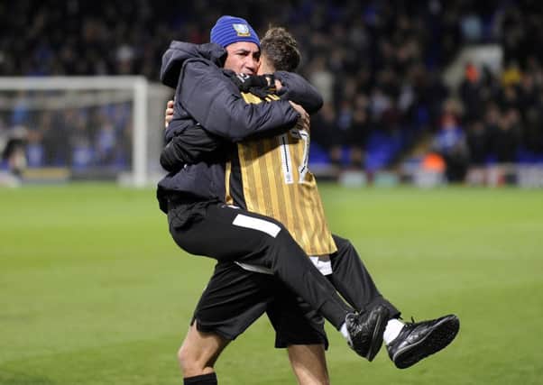 Atdhe Nuhiu is hugged by Sheffield Wednesday coach Bruno Lage after his late equaliser at Ipswich Town (Picture: Steve Ellis).