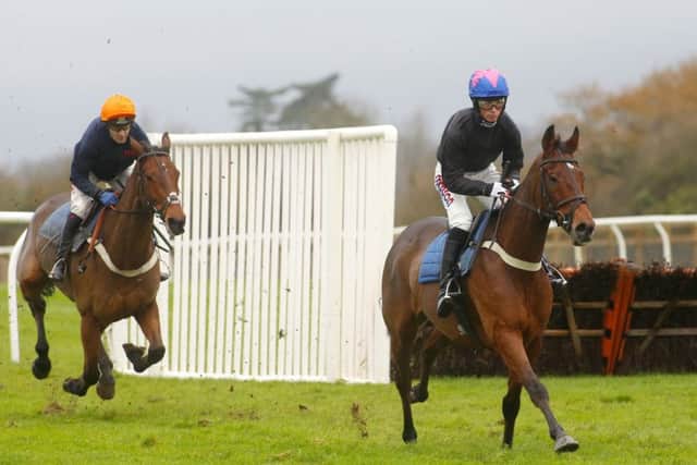 Harry Cobden and Cue Card, right, lead Tom Scudamore and Thistlecrack in a racecourse gallop at Wincanton. Picture: Julian Herbert/PA