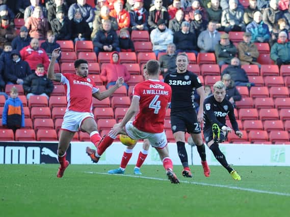 Gianni Alioski curls in Leeds United's second goal at Oakwell. Picture: James Hardisty.