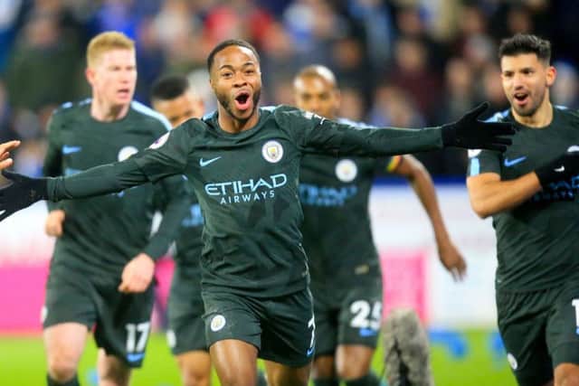 Manchester City's Raheem Sterling celebrates scoring a late winning goal against Huddersfield Town (Picture: Danny Lawson/PA Wire).ingle club/league/player publications.