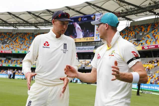 WE WON BY THIS MUCH: England's Joe Root chats with Australia's Steve Smith. Picture: Jason O'Brien/PA