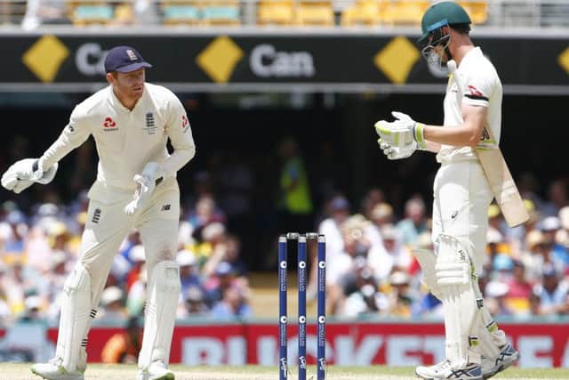 HEADS UP: England's Jonny Bairstow and Australia's Cameron Bancroft  during day five at The Gabbao. Picture: Jason O'Brien/PA