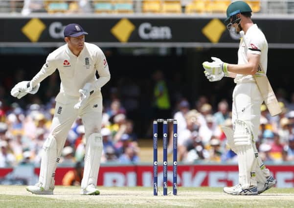 England's Jonny Bairstow and Australia's Cameron Bancroft on day five in Brisbane. Picture: Jason O'Brien/PA